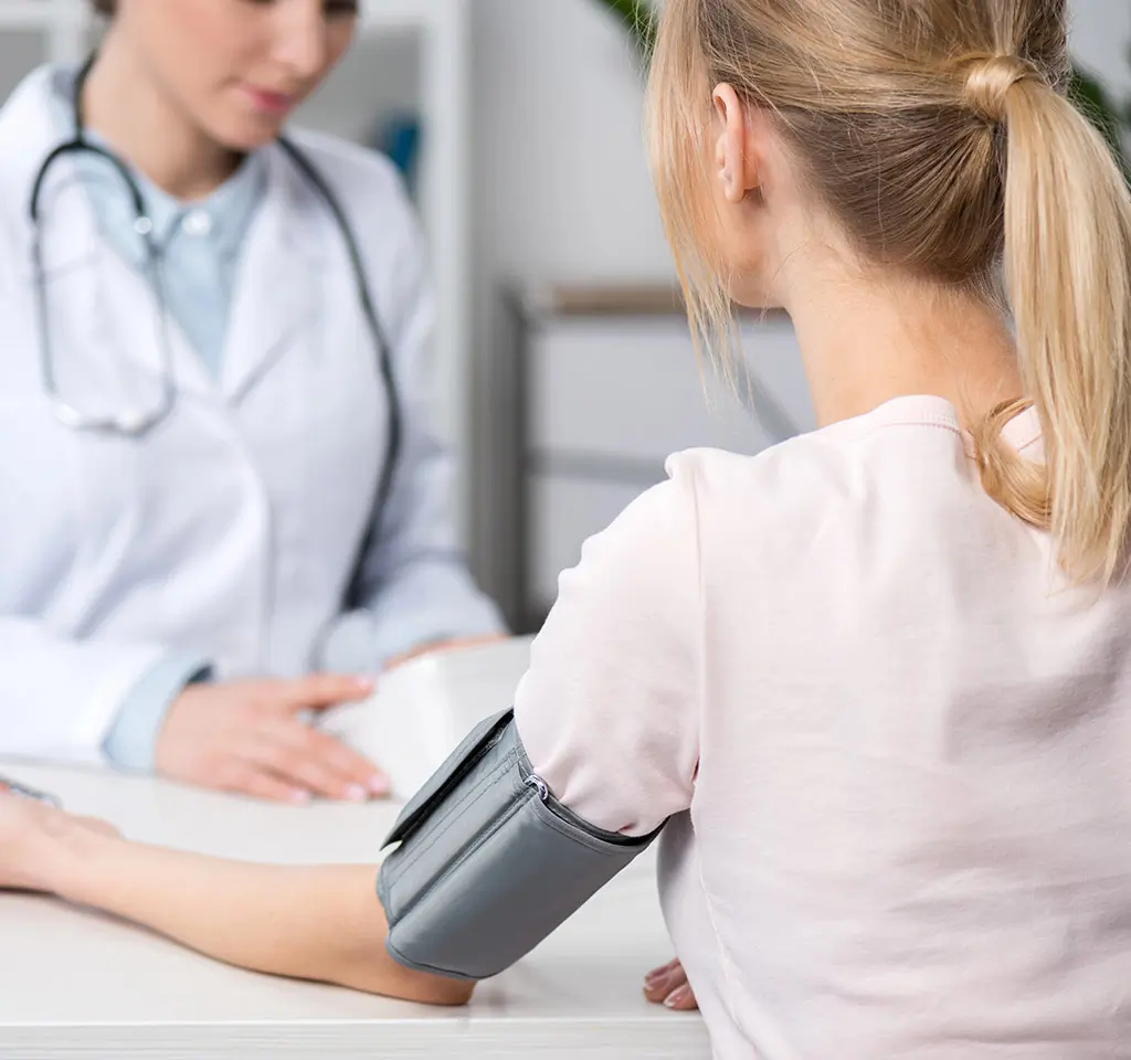Photo of a nurse drawing blood